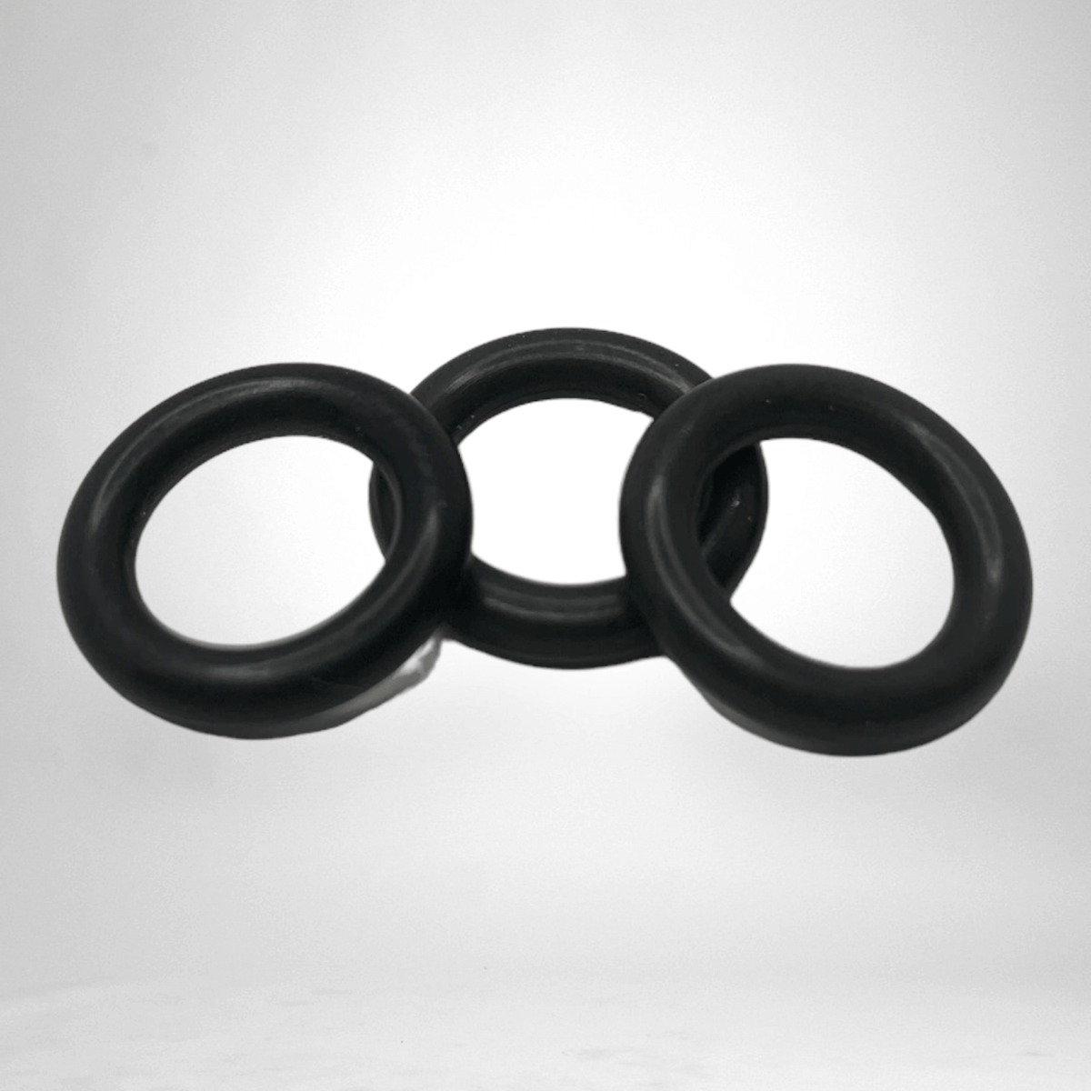Three black Z-RAM Heat Core valve-stem O-rings